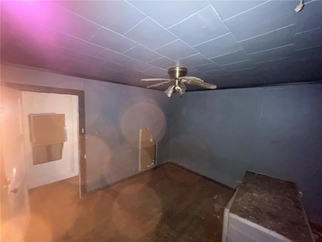 interior space featuring a ceiling fan