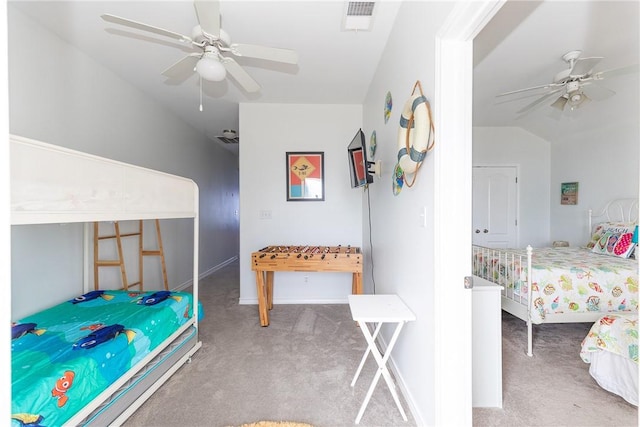 carpeted bedroom with ceiling fan, lofted ceiling, and visible vents