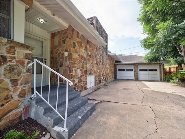 view of property exterior with a garage