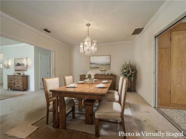 carpeted dining area with crown molding and an inviting chandelier