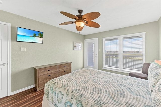 bedroom featuring ceiling fan and dark hardwood / wood-style flooring