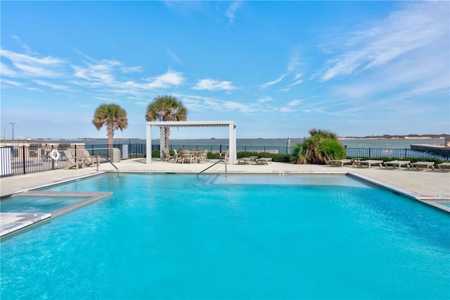 view of swimming pool with a patio area