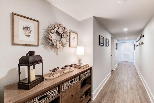 corridor featuring hardwood / wood-style floors