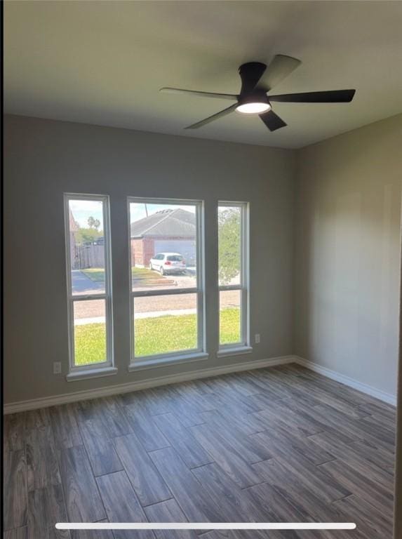 3141 Quail Springs Rd Unit 14, Corpus Christi, TX 78414 - spare room featuring wood finished floors, a ceiling fan, and baseboards