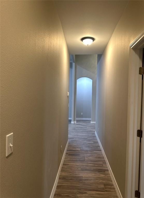3141 Quail Springs Rd Unit 14, Corpus Christi, TX 78414 - hall with arched walkways, dark wood-type flooring, and baseboards