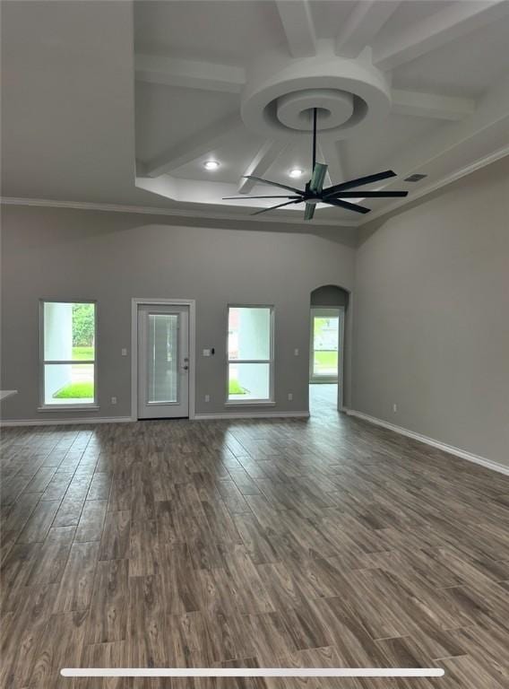 3141 Quail Springs Rd Unit 14, Corpus Christi, TX 78414 - unfurnished living room featuring a ceiling fan, coffered ceiling, baseboards, arched walkways, and dark wood-style floors