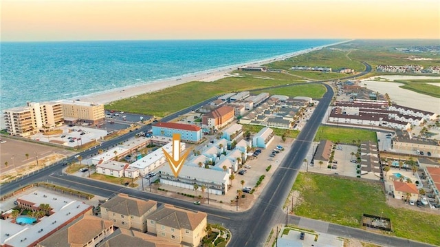 aerial view with a view of the beach and a water view