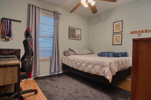 2850 Tuscarora Dr, Corpus Christi, TX 78410 - bedroom featuring wood finished floors, an office area, and ceiling fan