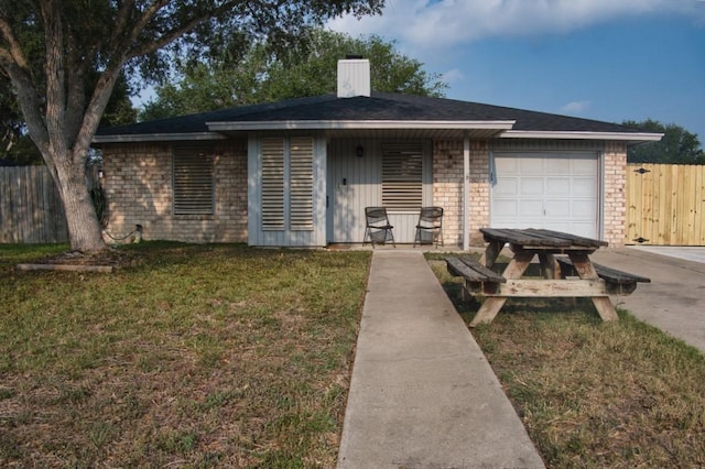 2850 Tuscarora Dr, Corpus Christi, TX 78410 - ranch-style home with a chimney and a garage