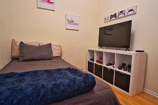 2850 Tuscarora Dr, Corpus Christi, TX 78410 - bedroom with wood finished floors and baseboards