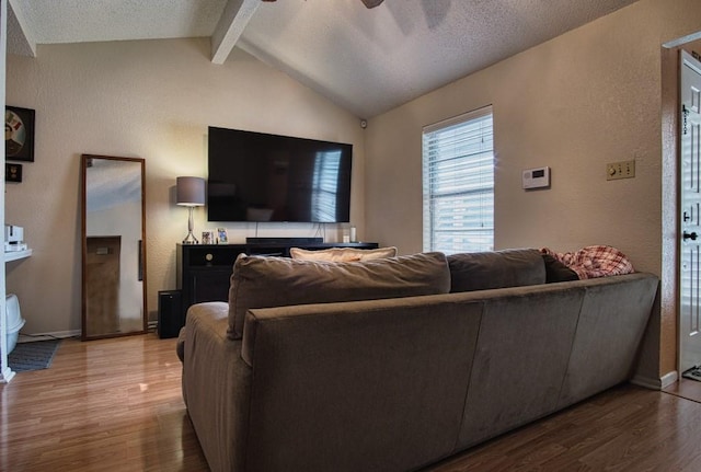 2850 Tuscarora Dr, Corpus Christi, TX 78410 - living area with light wood finished floors, ceiling fan, a textured ceiling, and baseboards