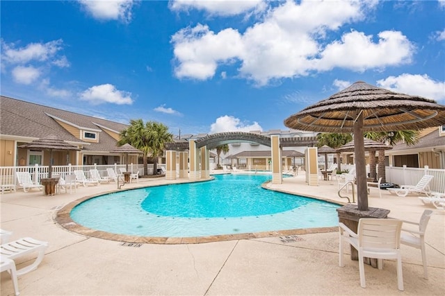 view of pool featuring a patio