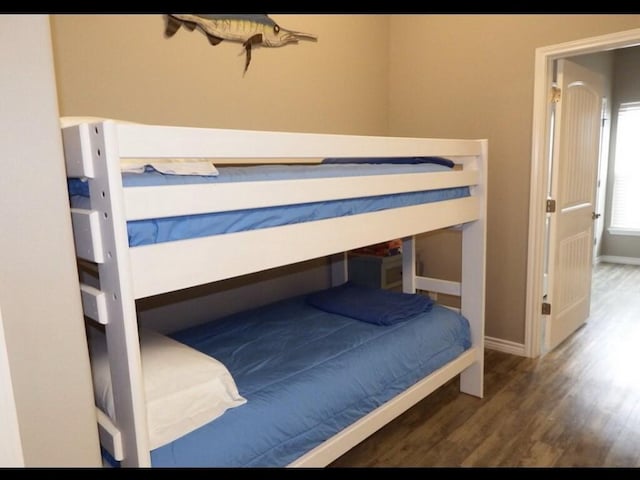 bedroom featuring dark hardwood / wood-style floors