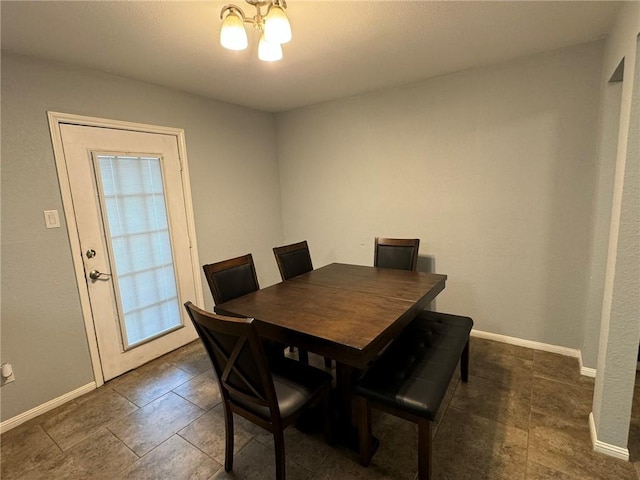 dining room featuring a chandelier