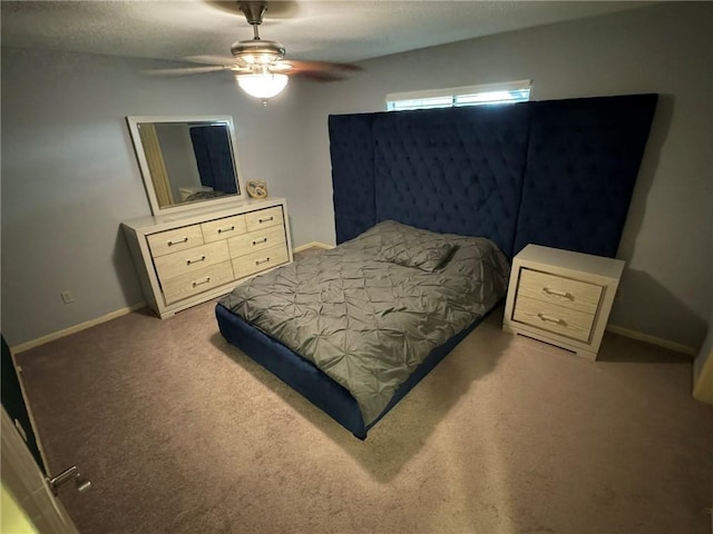 bedroom featuring ceiling fan and carpet floors