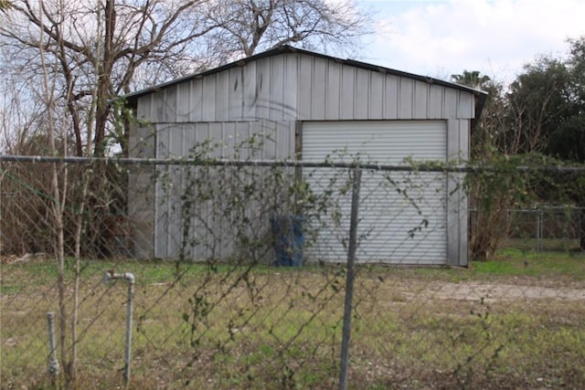 view of outbuilding with a garage