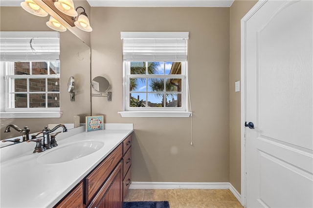 bathroom featuring tile patterned flooring and vanity