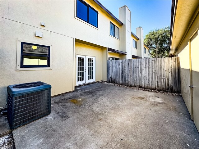 view of patio / terrace with central air condition unit and french doors