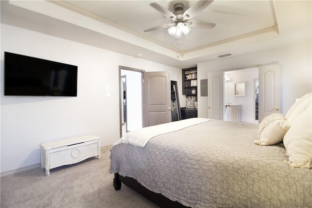 7002 Madiera Dr, Corpus Christi, TX 78414 - carpeted bedroom featuring a tray ceiling, crown molding, and ceiling fan
