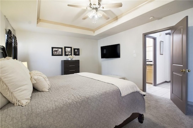 7002 Madiera Dr, Corpus Christi, TX 78414 - bedroom with a raised ceiling, light carpet, and ceiling fan