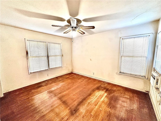 unfurnished room with wood-type flooring, a textured ceiling, and ceiling fan