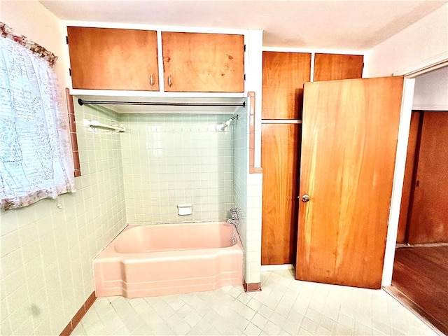 bathroom with tile patterned floors