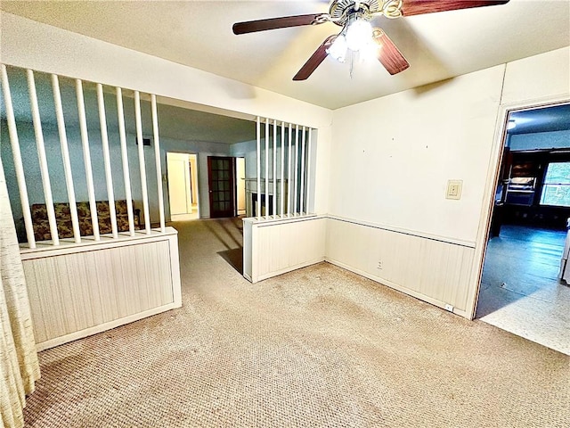 unfurnished room featuring ceiling fan