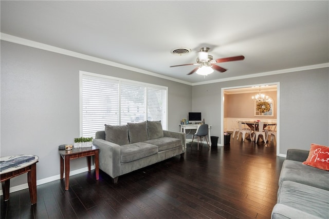 living room with ceiling fan with notable chandelier, dark hardwood / wood-style floors, and ornamental molding