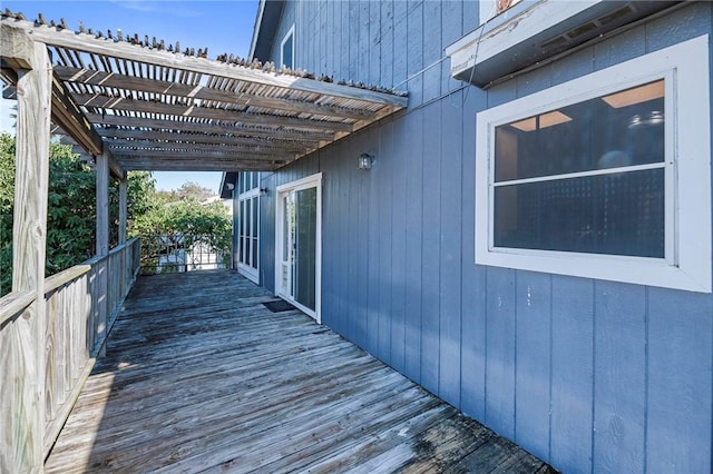 wooden terrace featuring a pergola