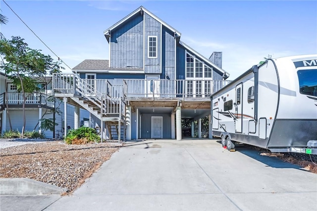 view of front facade with a carport