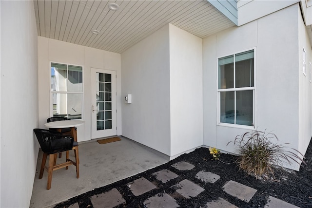 doorway to property featuring a patio area