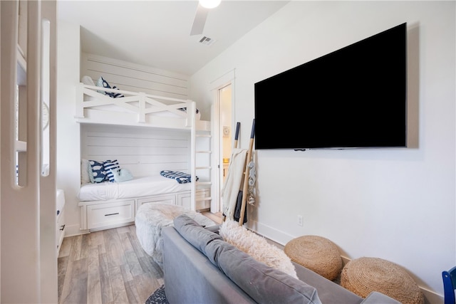 bedroom featuring ceiling fan and light hardwood / wood-style flooring