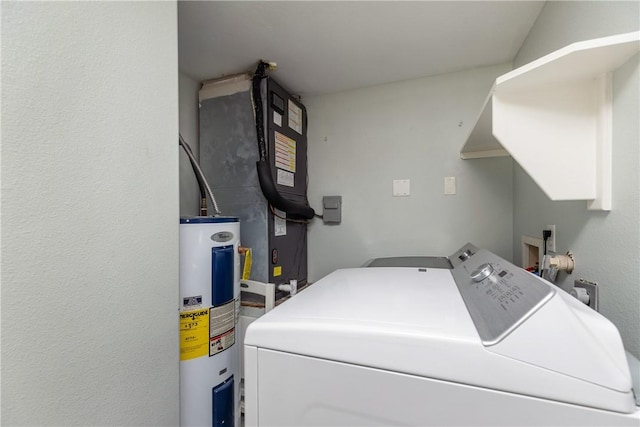 laundry area featuring electric water heater and separate washer and dryer