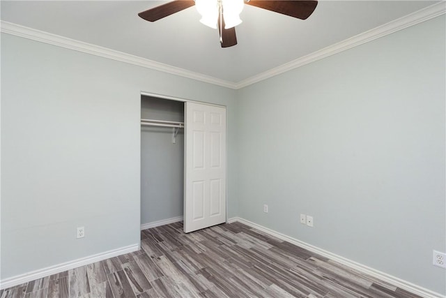 unfurnished bedroom with a closet, ceiling fan, ornamental molding, and hardwood / wood-style flooring