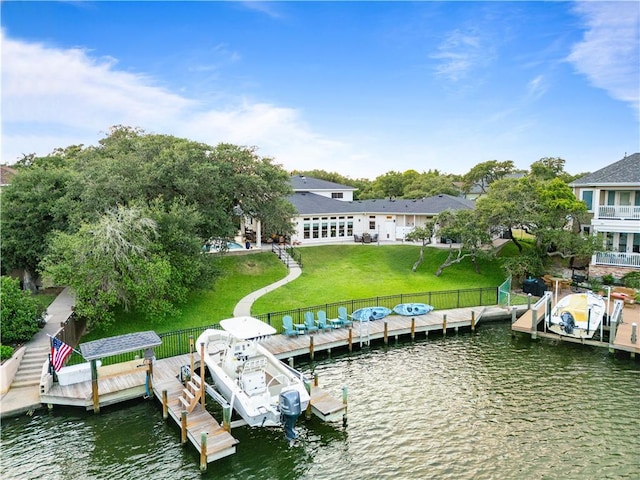 2110 Harbor Ct, Rockport, TX 78382 - dock featuring boat lift and a water view