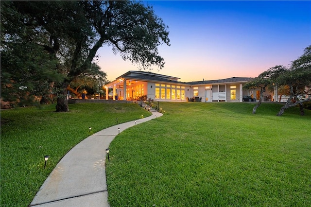 2110 Harbor Ct, Rockport, TX 78382 - yard at dusk featuring a yard