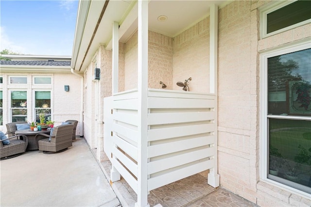 2110 Harbor Ct, Rockport, TX 78382 - property entrance with outdoor lounge area