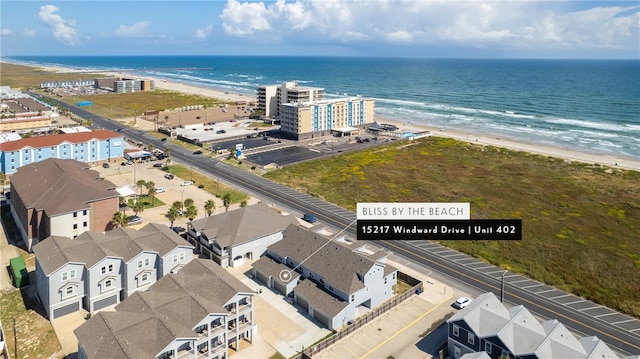 aerial view featuring a beach view and a water view