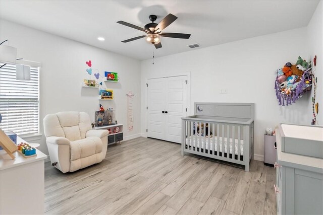 7910 Parham Dr, Corpus Christi, TX 78414 - bedroom featuring light wood-type flooring, multiple windows, recessed lighting, a ceiling fan, and a closet
