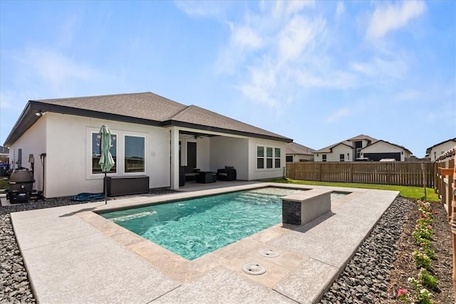 7910 Parham Dr, Corpus Christi, TX 78414 - back of house featuring ceiling fan, a patio, stucco siding, and a fenced backyard