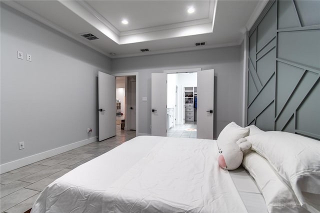 6730 Effat Dr, Corpus Christi, TX 78414 - bedroom featuring crown molding, a raised ceiling, recessed lighting, and a walk in closet