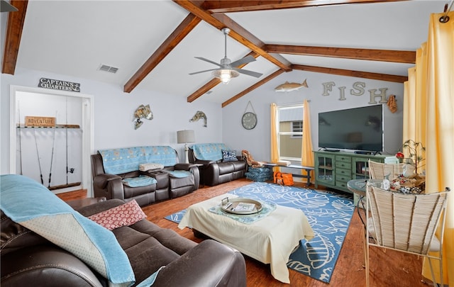 living room with hardwood / wood-style floors, lofted ceiling with beams, and ceiling fan