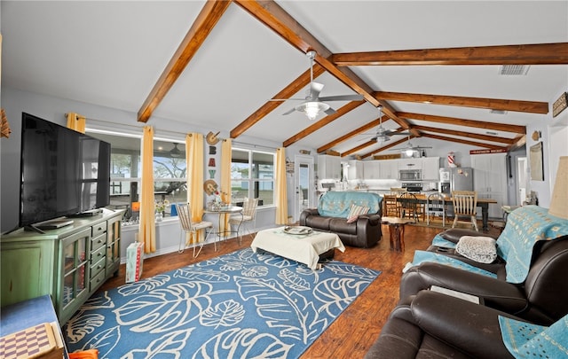 living room with lofted ceiling with beams, dark hardwood / wood-style floors, and ceiling fan