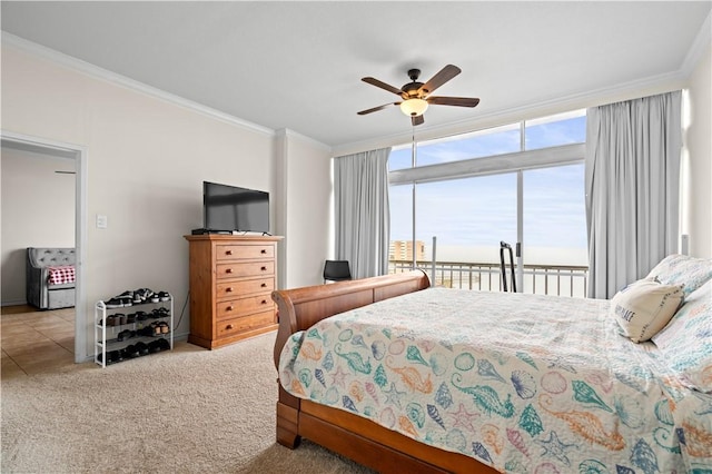 carpeted bedroom with ornamental molding, floor to ceiling windows, access to exterior, and ceiling fan