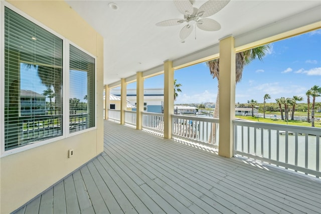 6 Sea Shell Shores Dr, Rockport, TX 78382 - wooden terrace with a water view and ceiling fan