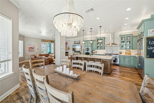 6 Sea Shell Shores Dr, Rockport, TX 78382 - dining space with recessed lighting, wood finished floors, visible vents, baseboards, and a chandelier