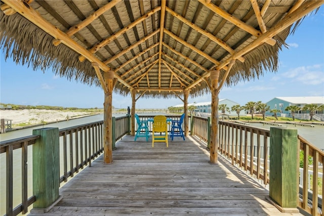 6 Sea Shell Shores Dr, Rockport, TX 78382 - view of dock with a gazebo, outdoor dining area, and a deck