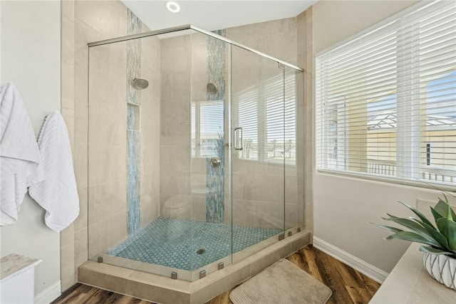 6 Sea Shell Shores Dr, Rockport, TX 78382 - full bath with baseboards, wood finished floors, and a stall shower