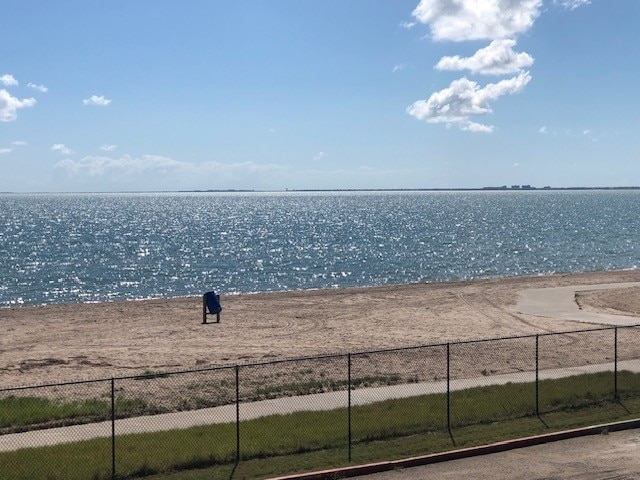 property view of water featuring a beach view