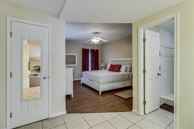 bedroom featuring ceiling fan and light wood-type flooring